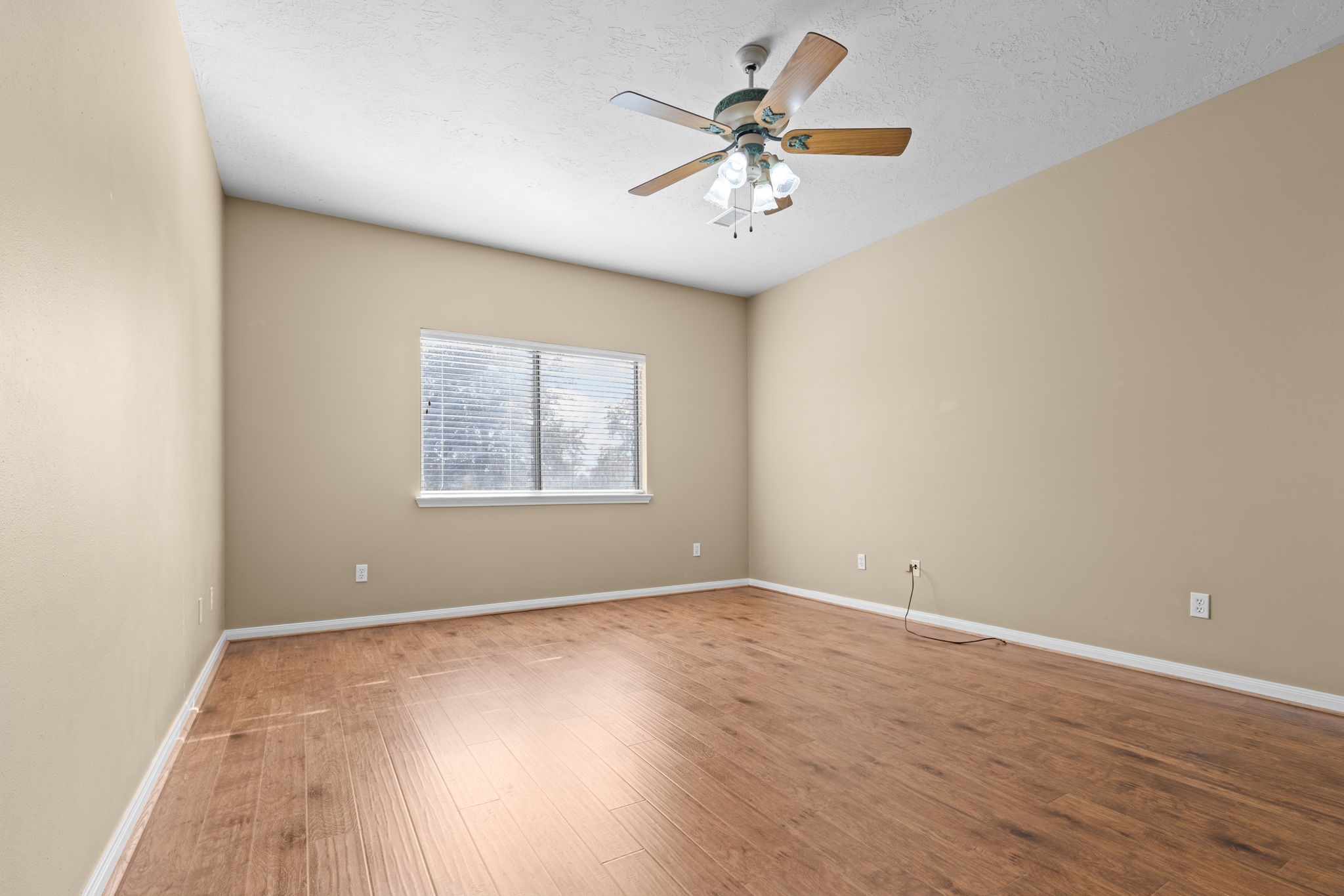 24236 Stuebner Airline Road Tomball, TX 77375 - Photo 19 of 39 King-sized primary bedroom.