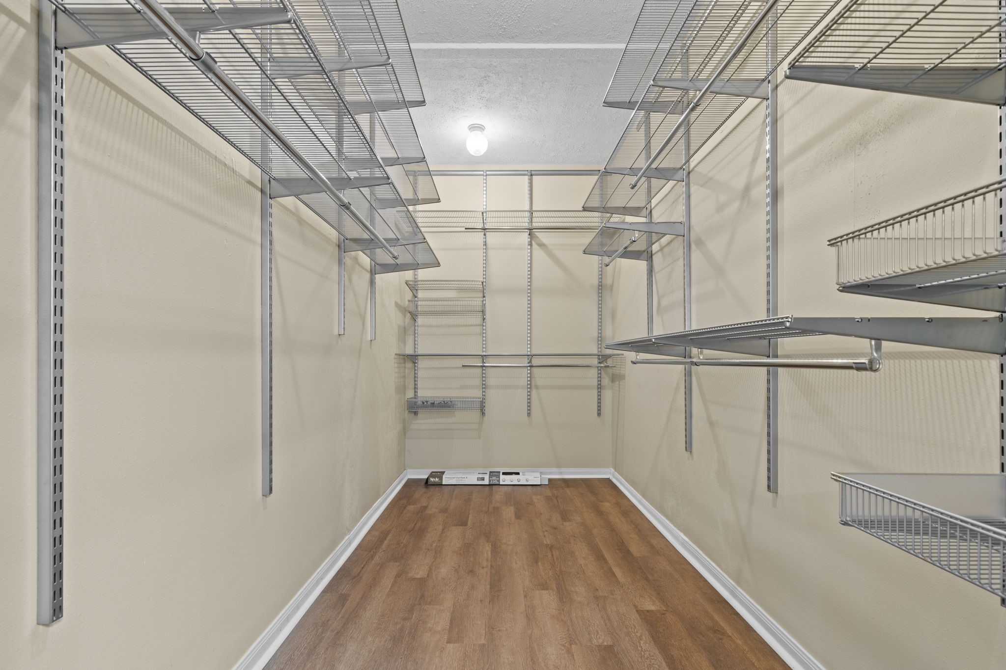 24236 Stuebner Airline Road Tomball, TX 77375 - Photo 21 of 39 a view of a room with wooden floor