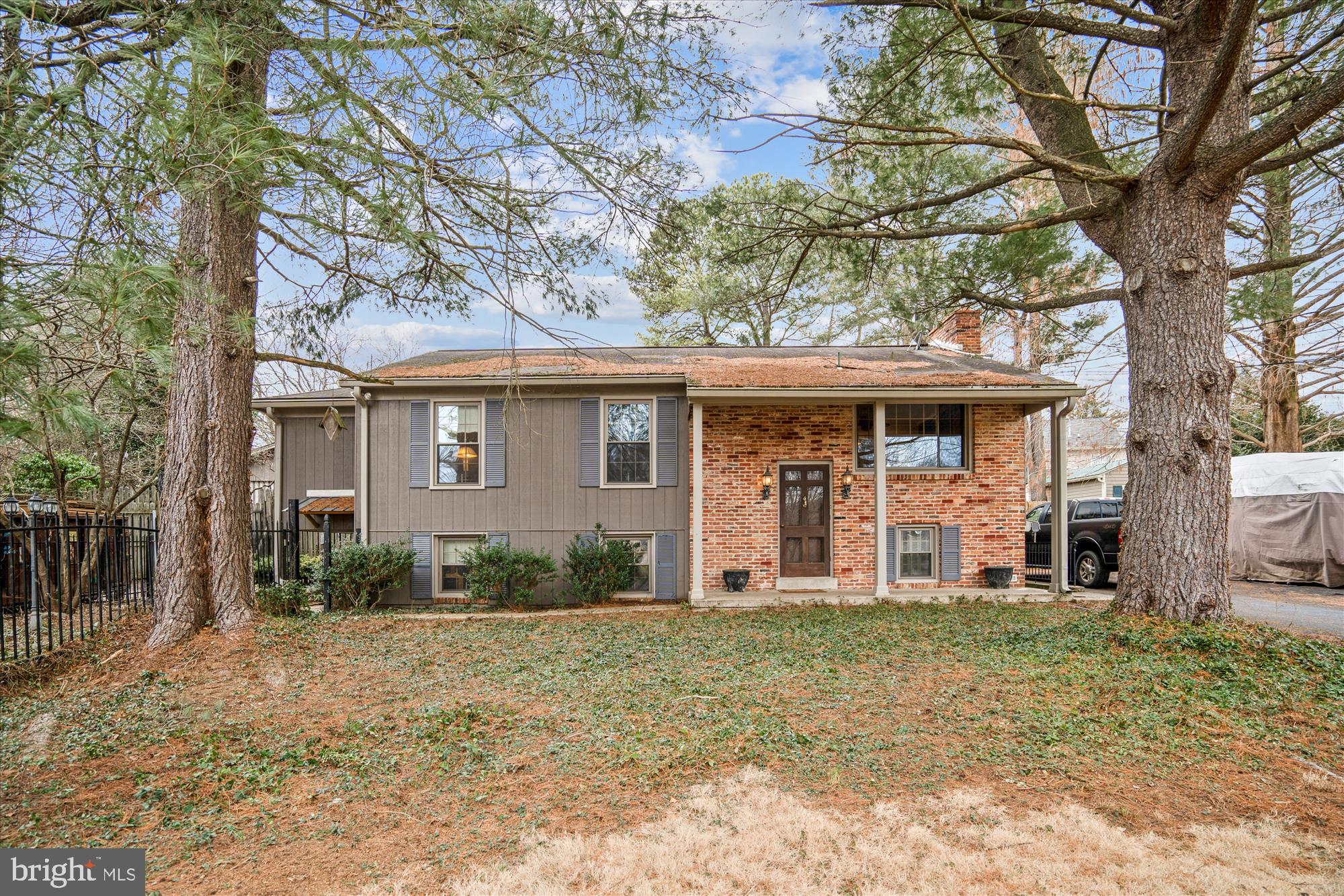front view of a house with a yard