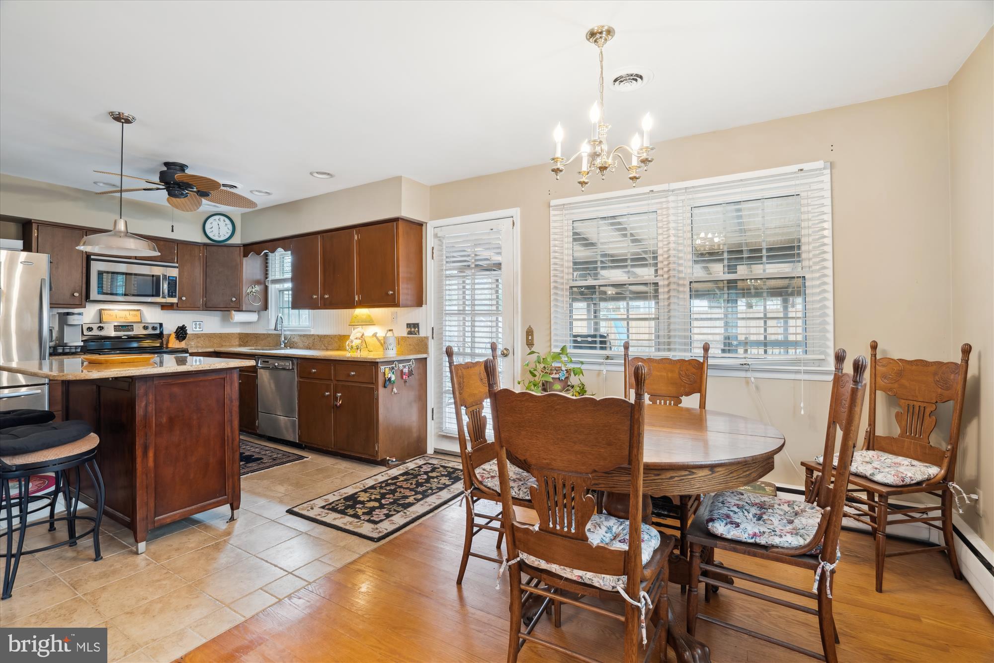 11319 Harding Road Laurel, MD 20723 - Photo 11 of 44 a view of a dining room with furniture window and outside view