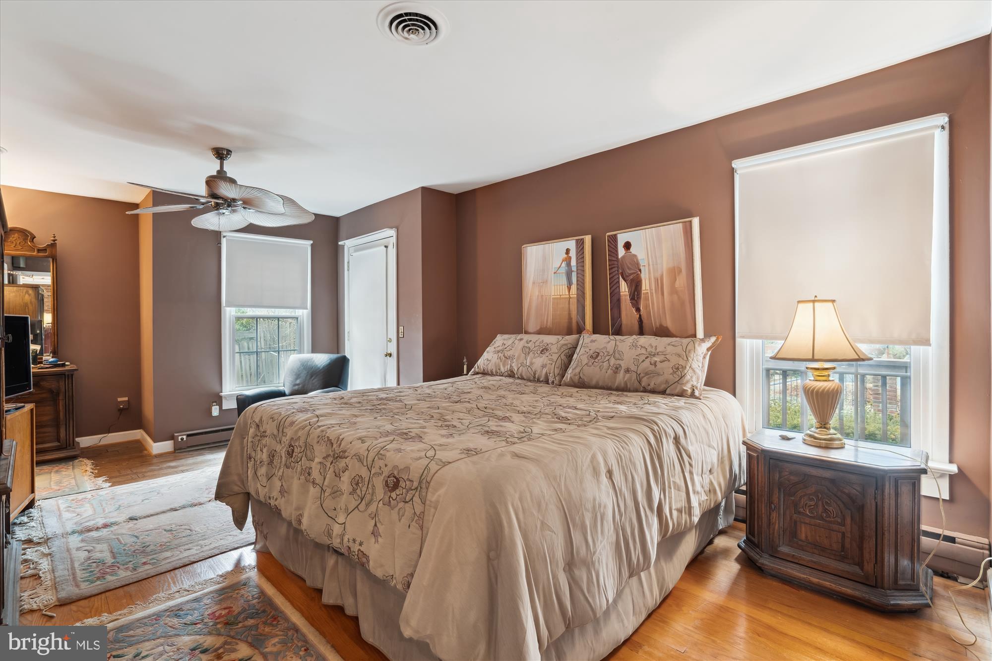 11319 Harding Road Laurel, MD 20723 - Photo 14 of 44 a bed room with a bed window and a dresser