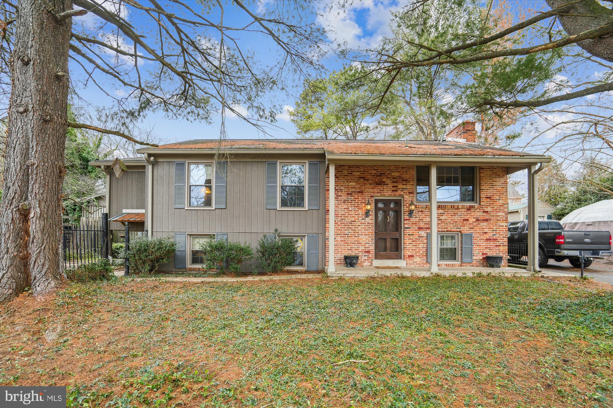 11319 Harding Road Laurel, MD 20723 - Photo 2 of 44 a front view of a house with garden