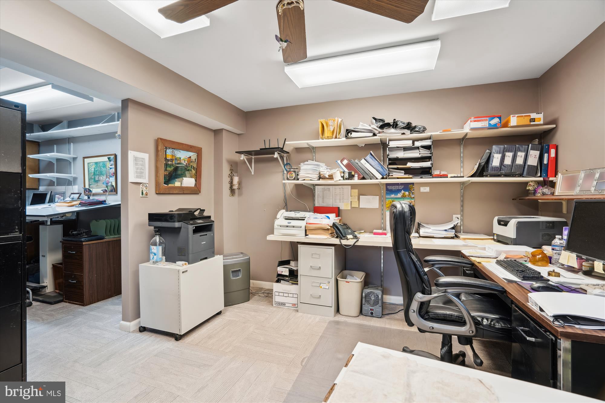 11319 Harding Road Laurel, MD 20723 - Photo 27 of 44 a room with furniture a rug and a window
