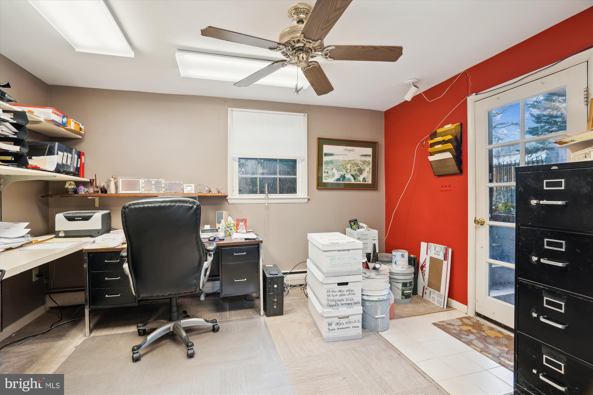 11319 Harding Road Laurel, MD 20723 - Photo 28 of 44 a view of a workspace with furniture and a window