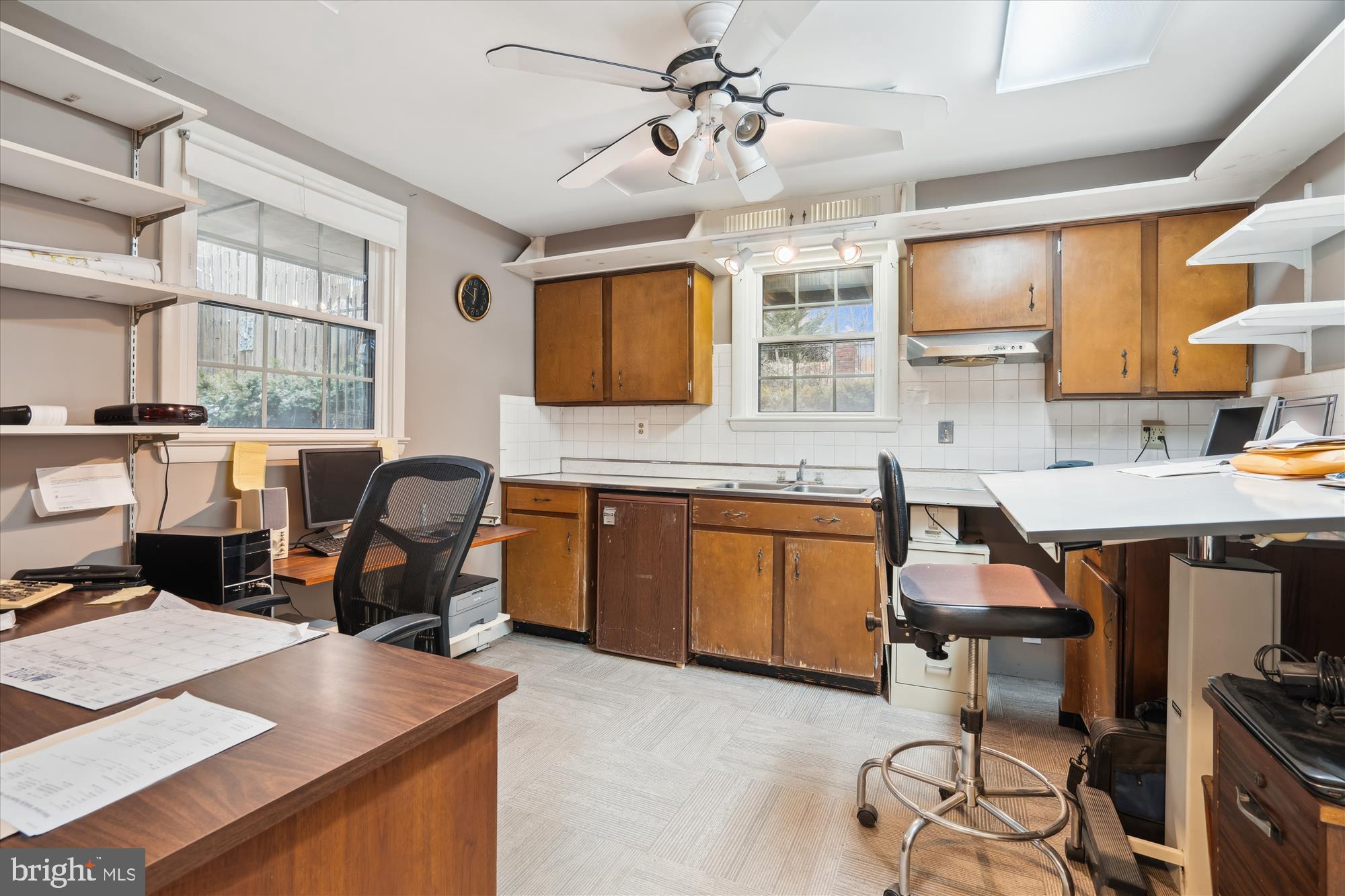 11319 Harding Road Laurel, MD 20723 - Photo 29 of 44 a work place with a desk chair and painted walls