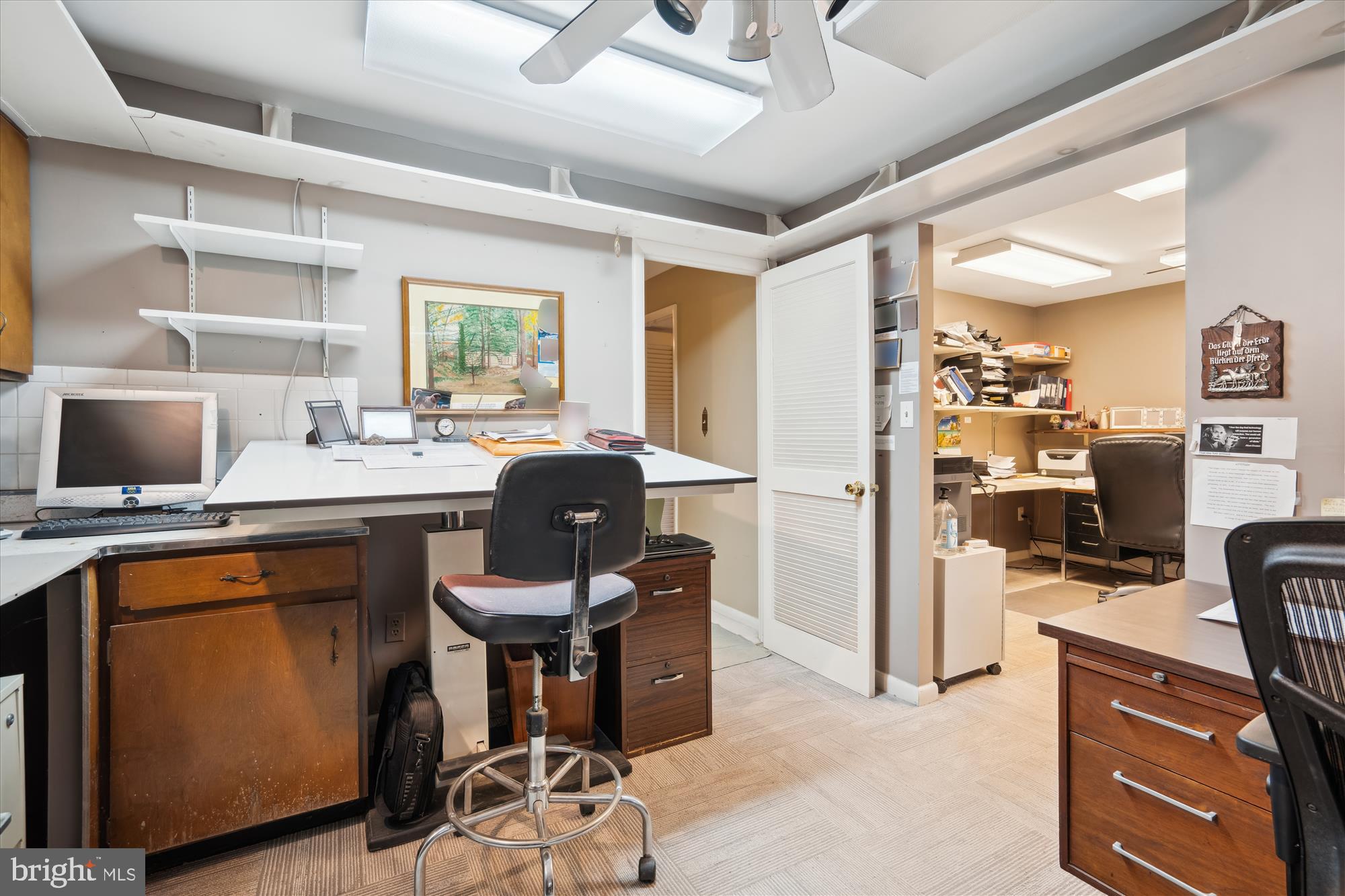 11319 Harding Road Laurel, MD 20723 - Photo 30 of 44 a room with furniture a flat screen tv and a window