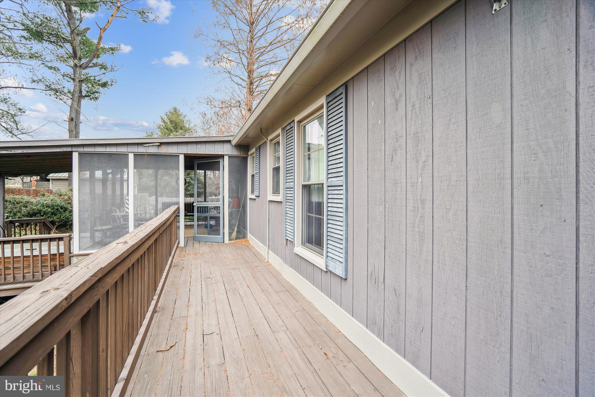 11319 Harding Road Laurel, MD 20723 - Photo 38 of 44 a view of balcony with wooden floor and fence
