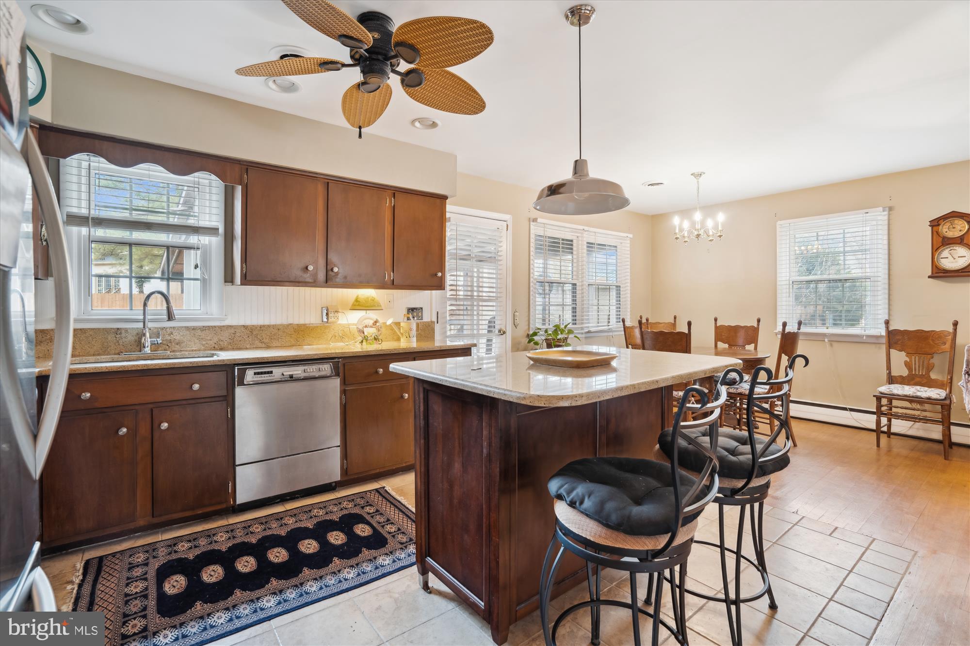 11319 Harding Road Laurel, MD 20723 - Photo 9 of 44 a kitchen with a table and chairs in it