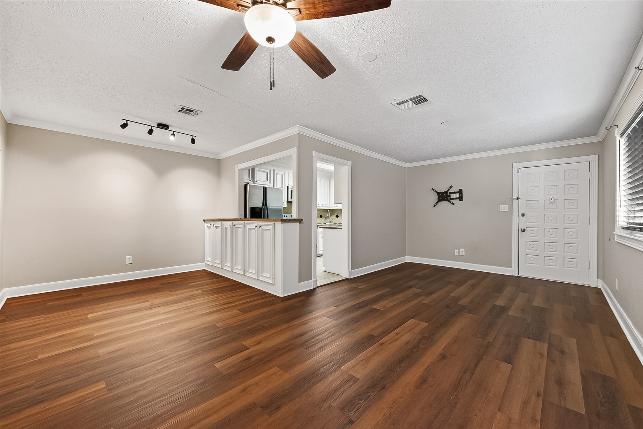 4727 Merwin Street, Unit A Houston, TX 77027 - Photo 45 of 45 An open concept floor plan with gorgeous flooring throughout! Crown Molding and an abundance of closet space are also an added plus!
