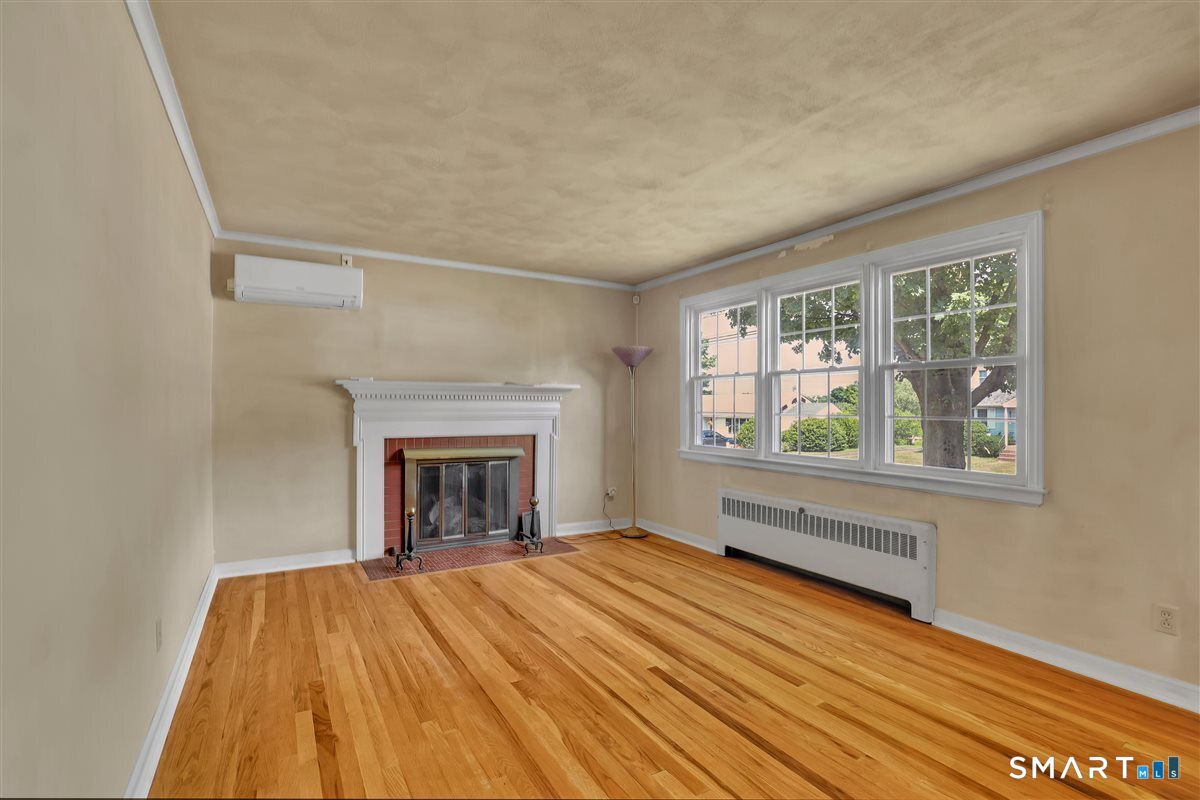 64 Bretton Road Manchester, CT 06042 - Photo 10 of 30 Living room with a gas fireplace