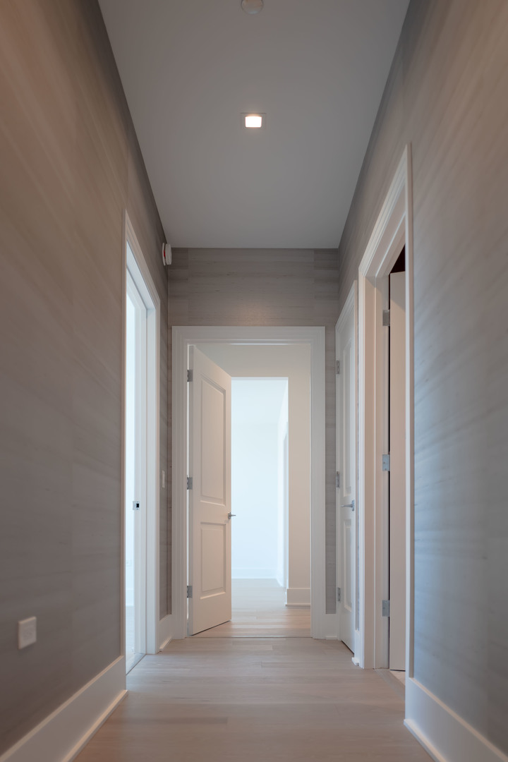 363 East Wacker Drive, Unit 3404 Chicago, IL 60601 - Photo 12 of 22 an empty room with closet and windows