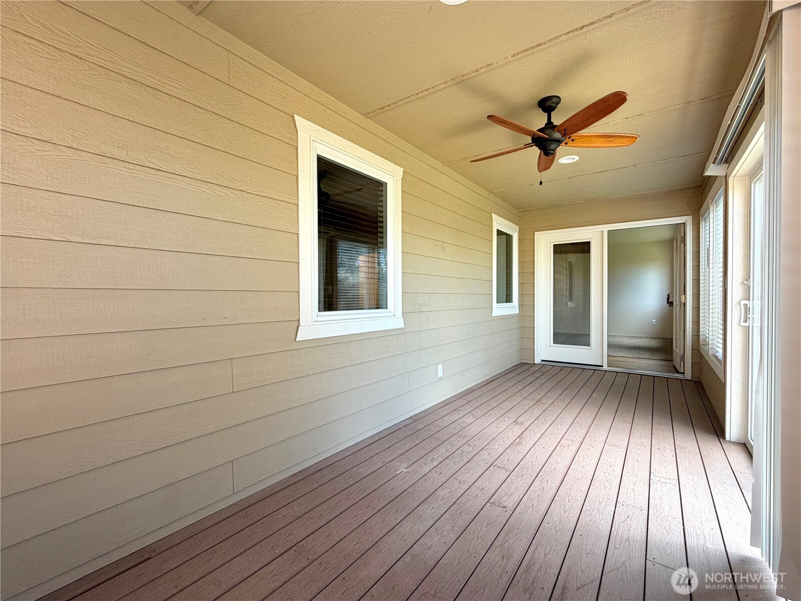 709 Paintbrush Lane Omak, WA 98841 - Photo 16 of 40 a view of empty room with wooden floor and fan