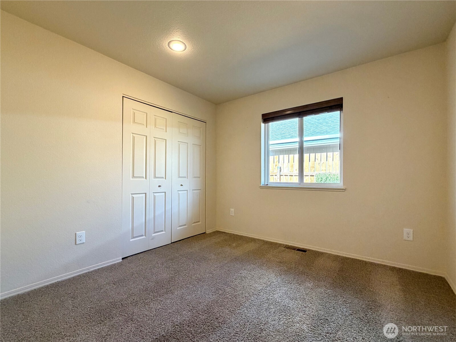 709 Paintbrush Lane Omak, WA 98841 - Photo 23 of 40 an empty room with windows