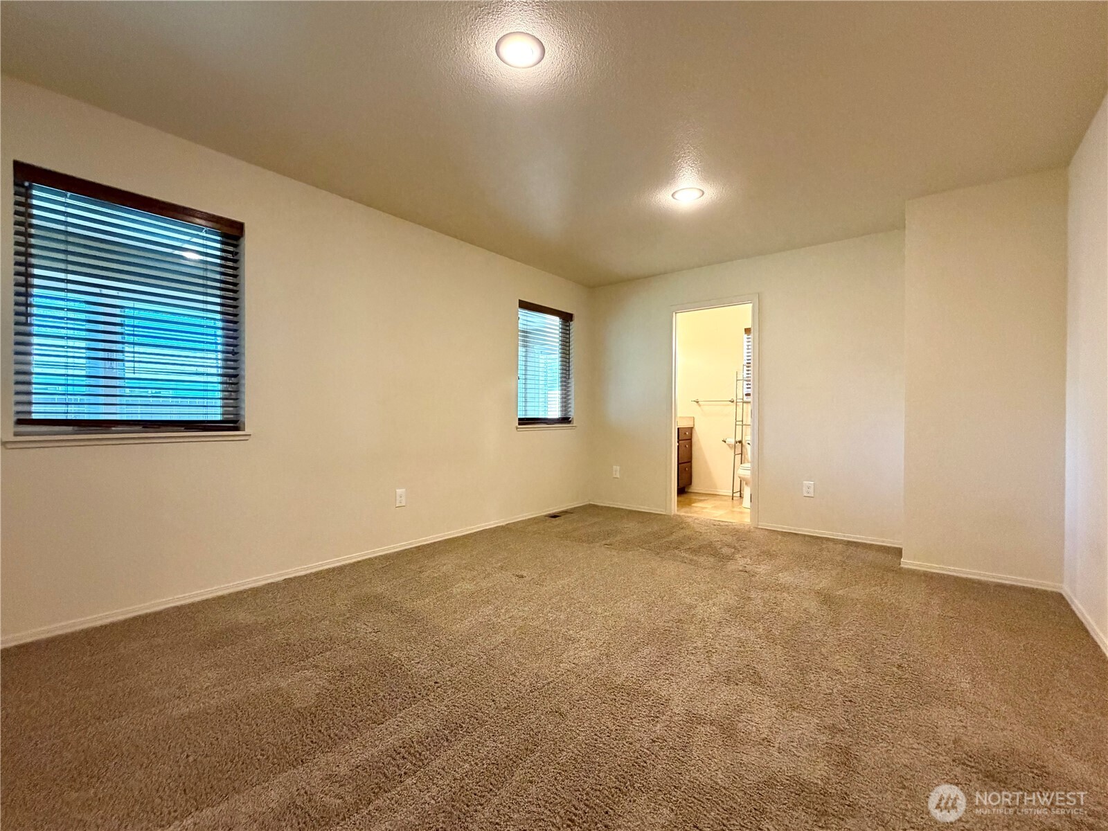 709 Paintbrush Lane Omak, WA 98841 - Photo 29 of 40 a view of an empty room with a window