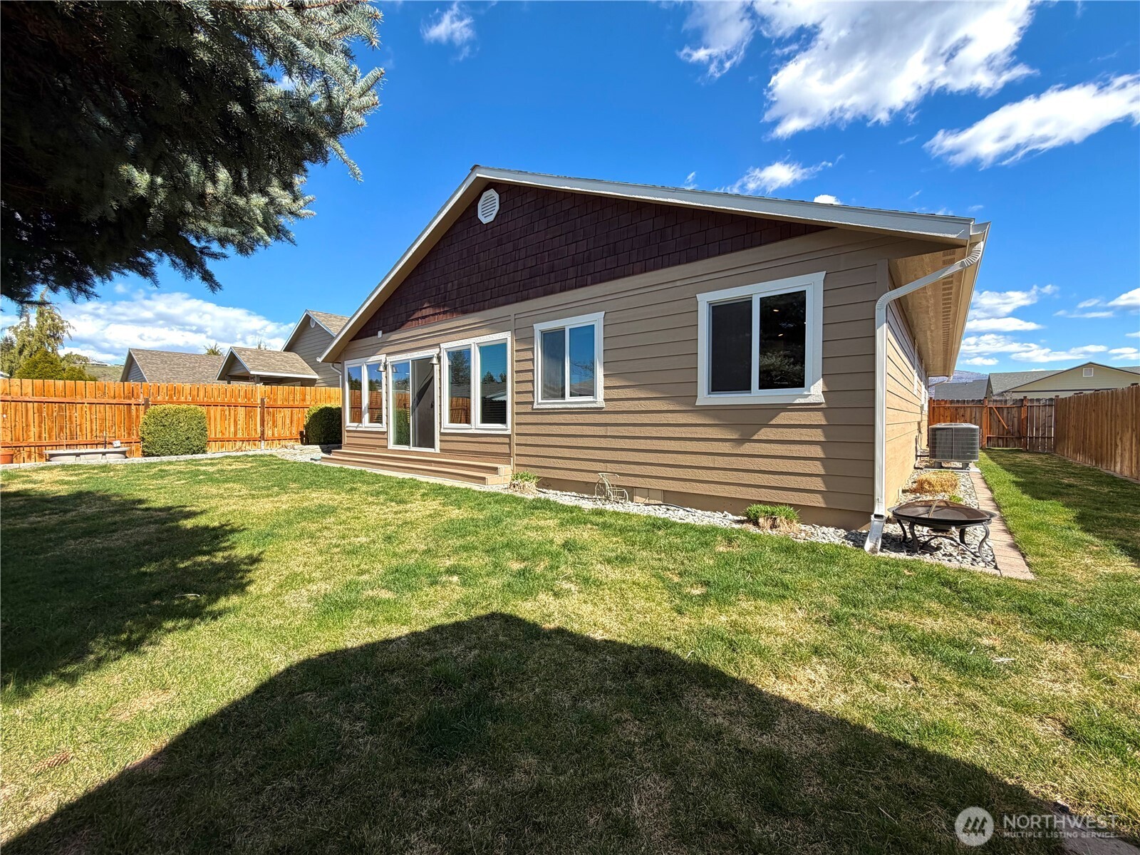 709 Paintbrush Lane Omak, WA 98841 - Photo 36 of 40 a house view with a garden space