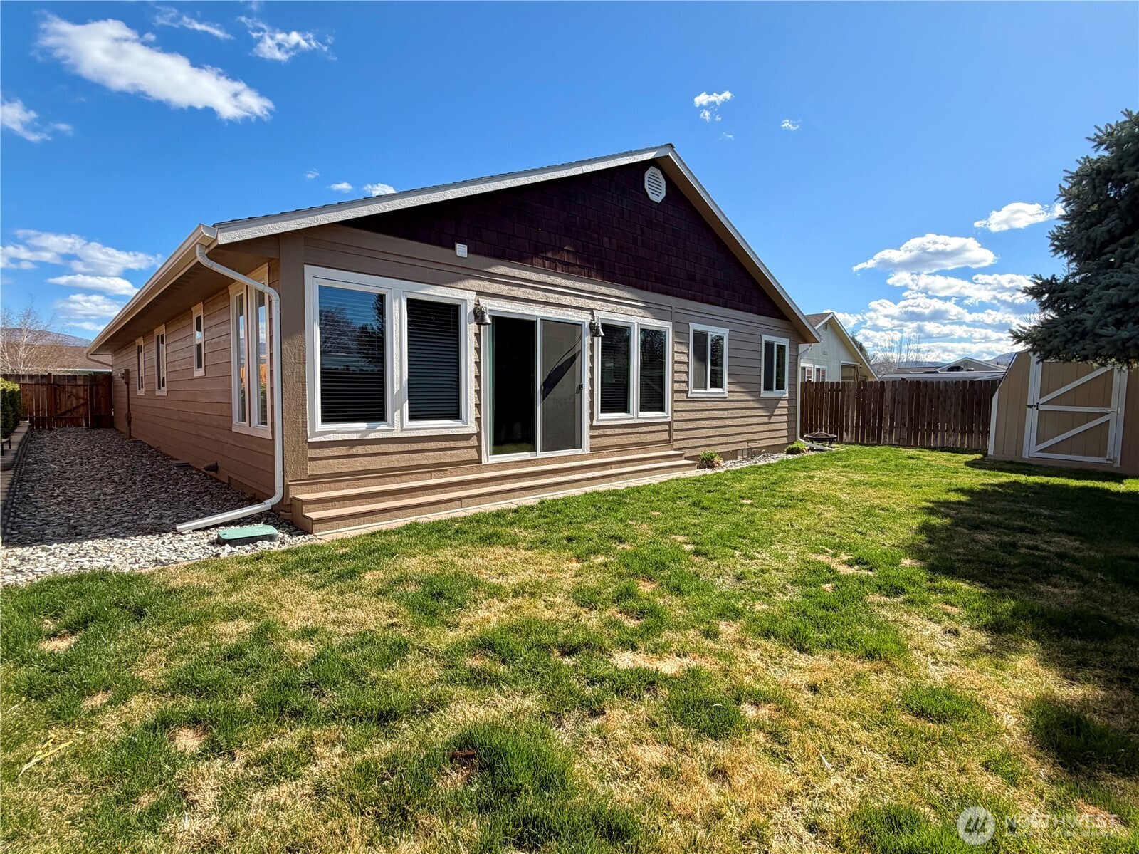 709 Paintbrush Lane Omak, WA 98841 - Photo 38 of 40 a front view of a house with garden