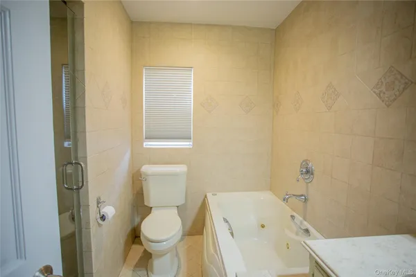 a bathroom with a sink and toilet