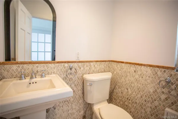 a bathroom with a sink and a toilet