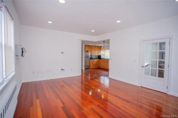 a view of a livingroom with wooden floor