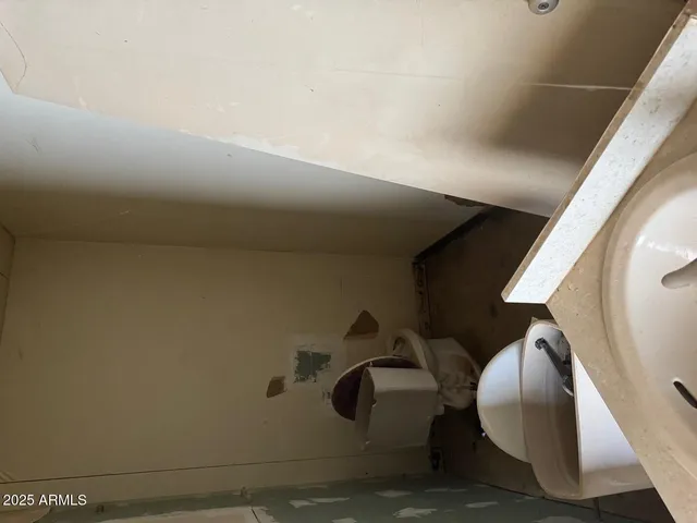 a view of a backyard of the house