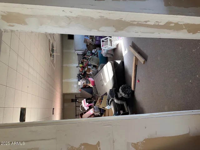 a room with gym equipment and window