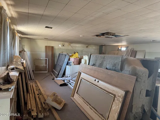 a backyard of a house with large trees