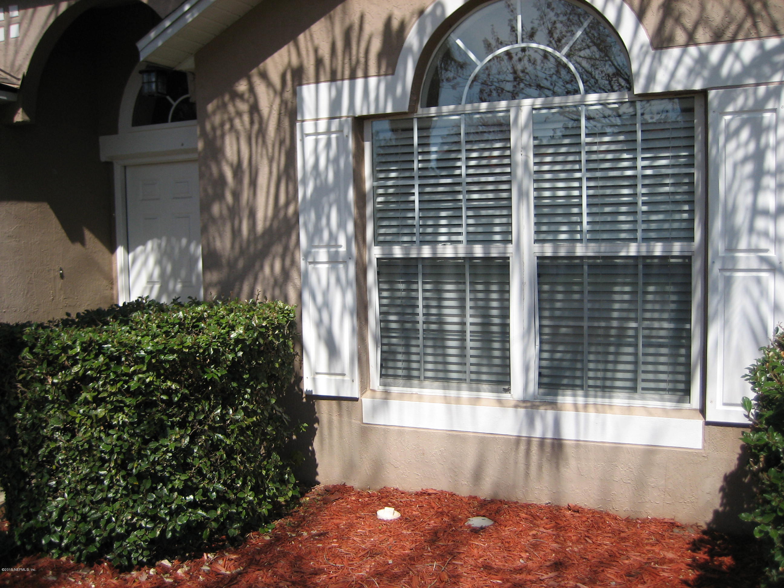 3236 Carlotta Road Middleburg, FL 32068 - Photo 2 of 18 a front view of a house with a yard