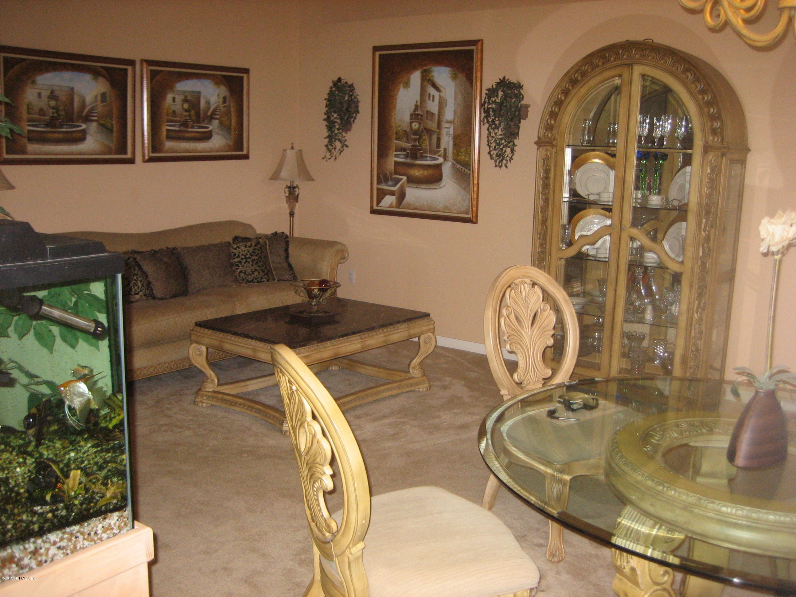 3236 Carlotta Road Middleburg, FL 32068 - Photo 7 of 18 a view of a livingroom with furniture