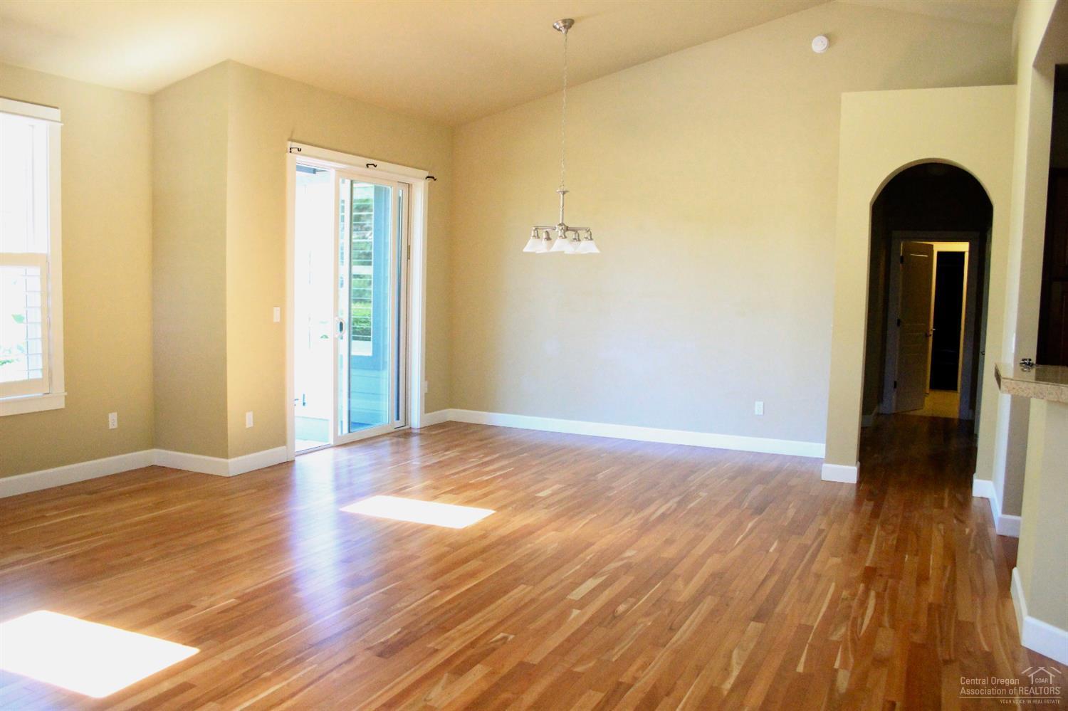 19459 Blue Lake Loop Bend, OR 97702 - Photo 19 of 19 a view of a room with wooden floor and a window