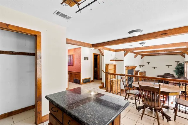 a dining room with furniture and a table
