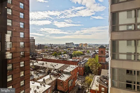 a view of a city with tall buildings