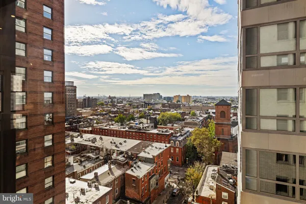 a view of a city with tall buildings