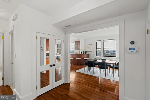 a view of a livingroom with furniture and wooden floor