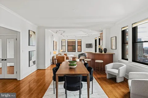 a view of a livingroom with furniture and a table