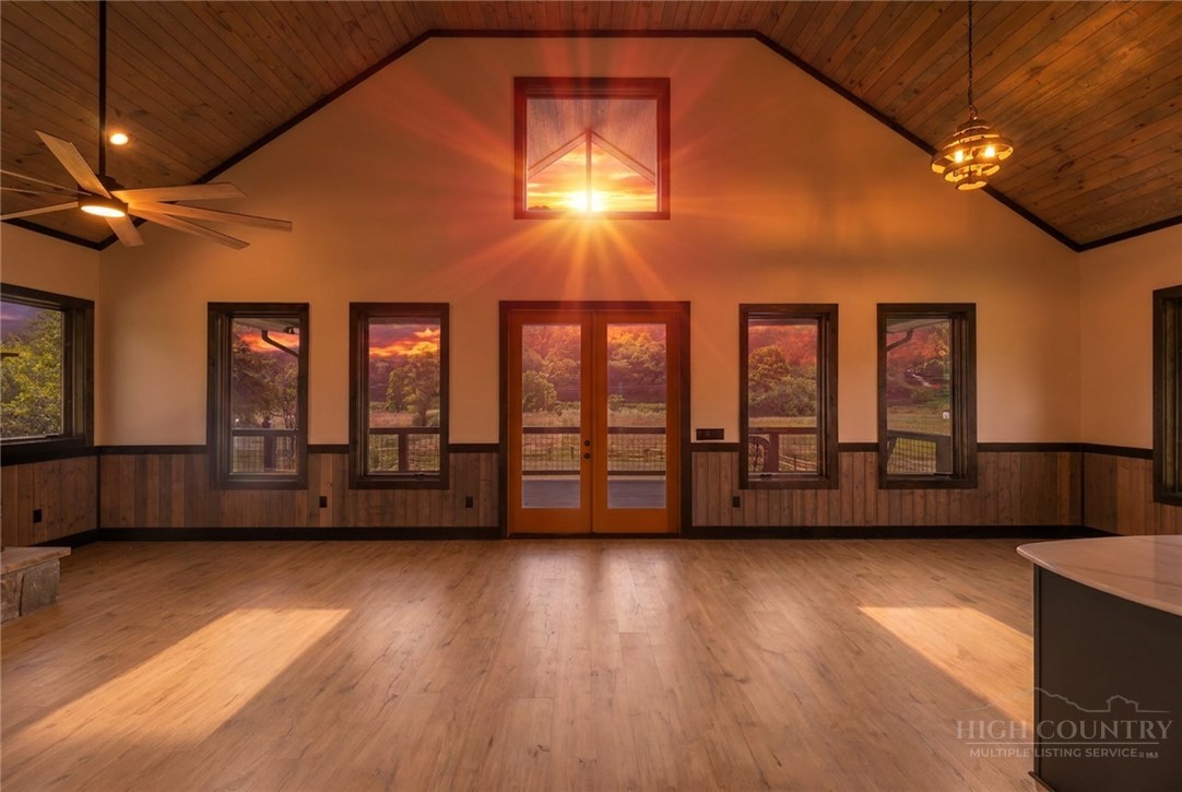 790 Howard Edmisten Road Sugar Grove, NC 28679 - Photo 35 of 45 a view of an empty room with a window and wooden floor