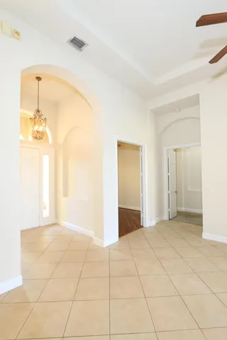 a kitchen that has a sink and a stove