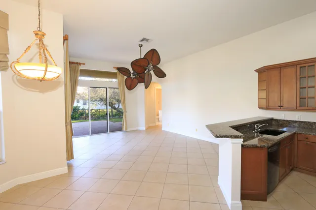 a view of swimming pool with a garden and seating area