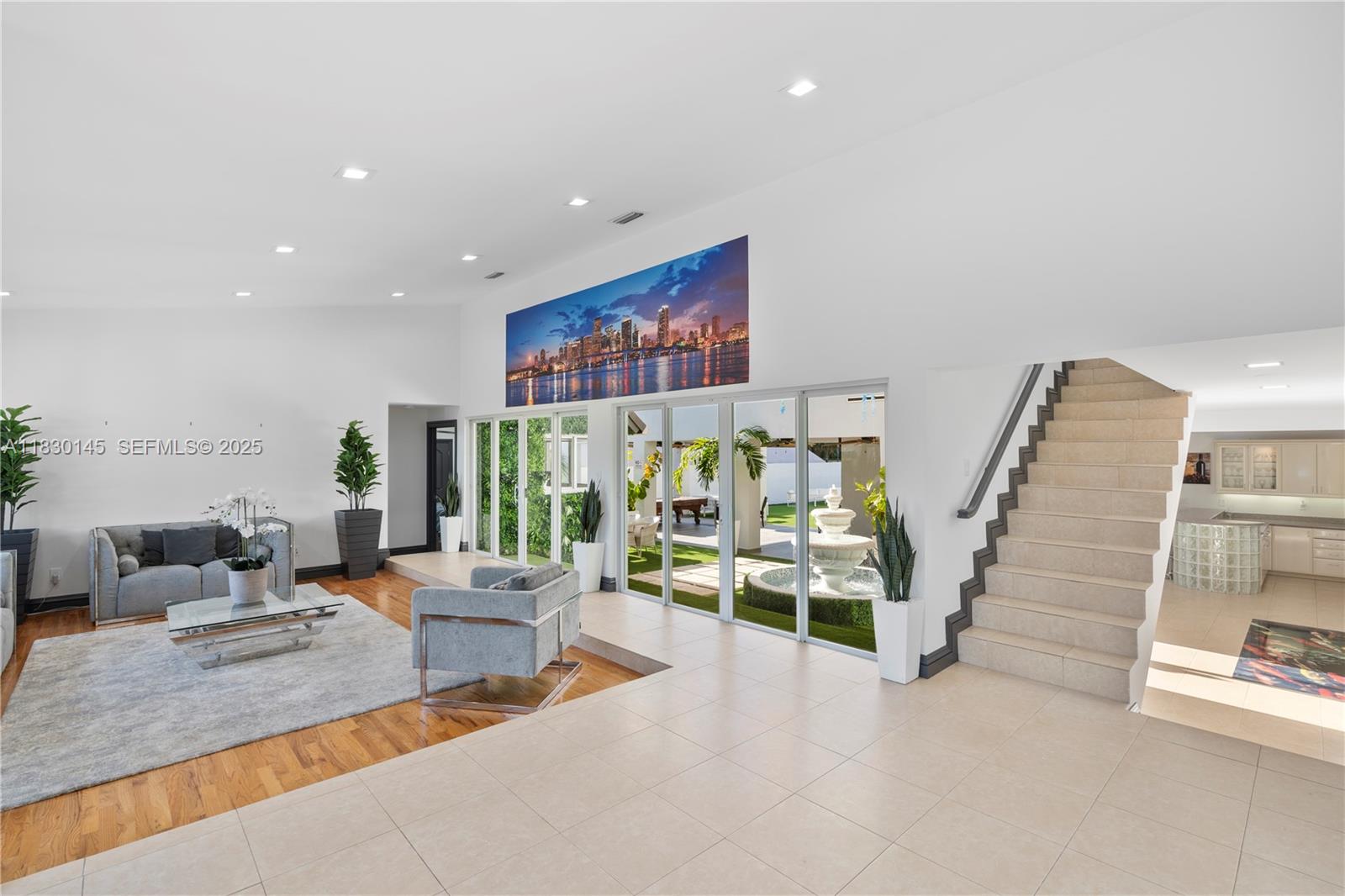 13815 Southwest 38th Street Miami, FL 33175 - Photo 13 of 75 a living room with furniture and white walls