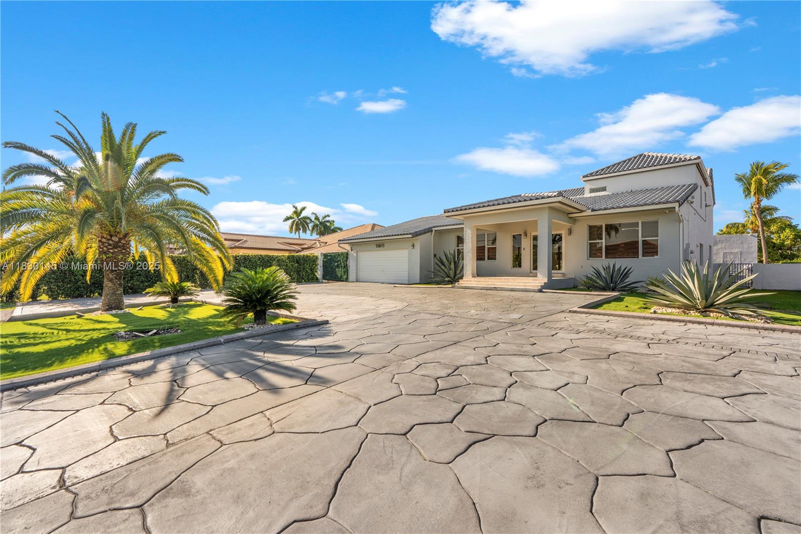 13815 Southwest 38th Street Miami, FL 33175 - Photo 2 of 63 a view of a house with backyard and sitting area