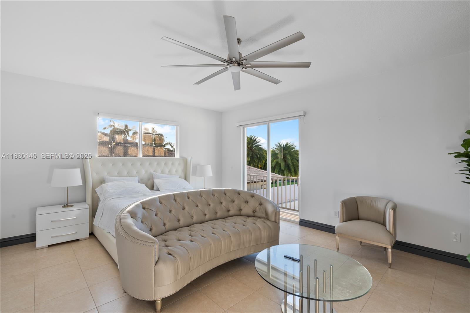 13815 Southwest 38th Street Miami, FL 33175 - Photo 36 of 75 a living room with furniture and a large window