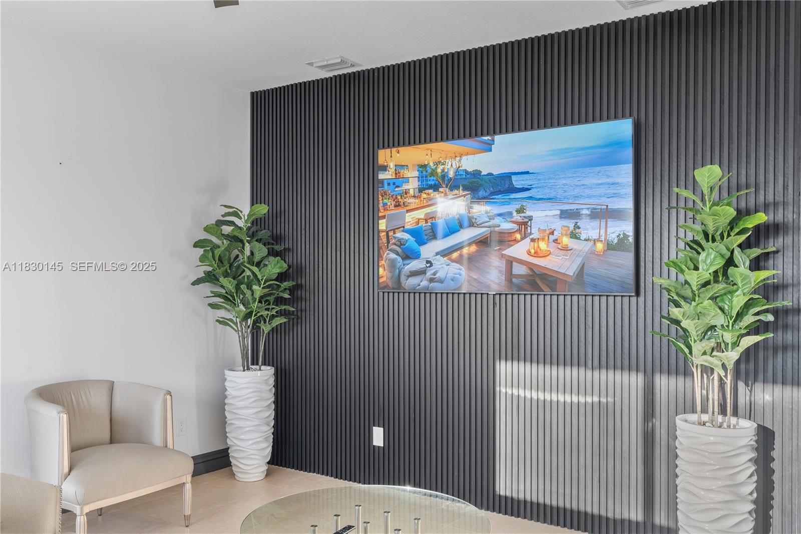 13815 Southwest 38th Street Miami, FL 33175 - Photo 38 of 75 a vase with flowers sitting on a table in front of a door