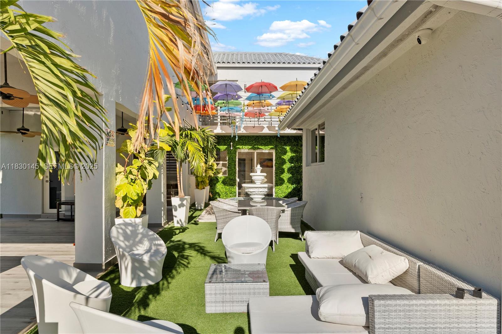 13815 Southwest 38th Street Miami, FL 33175 - Photo 51 of 75 a front view of a house with outdoor seating