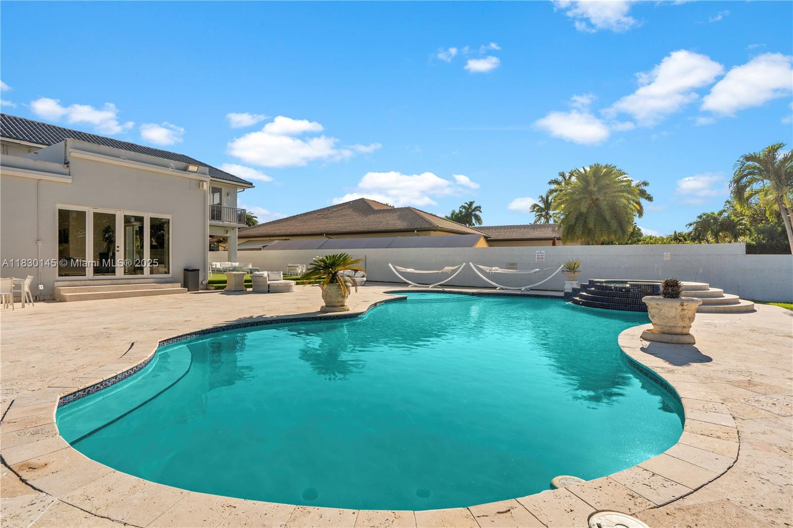 13815 Southwest 38th Street Miami, FL 33175 - Photo 54 of 63 a view of a swimming pool with a yard