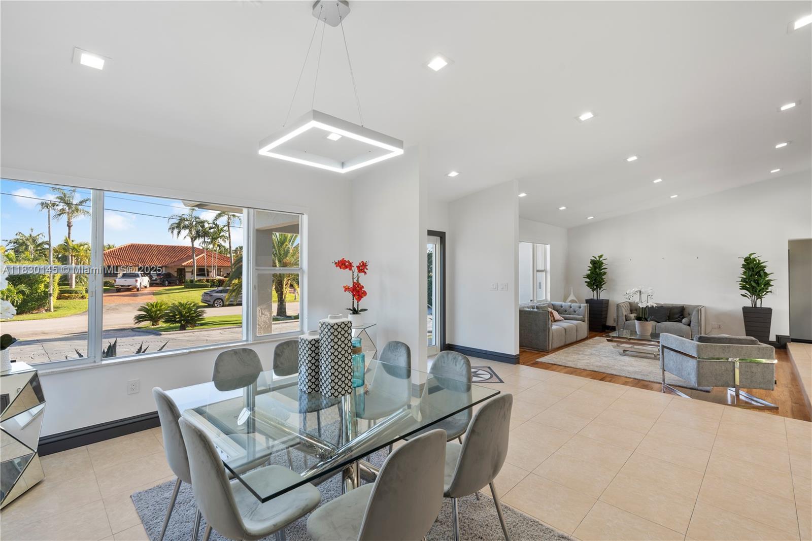 13815 Southwest 38th Street Miami, FL 33175 - Photo 8 of 63 a view of a dining room with furniture window and outside view