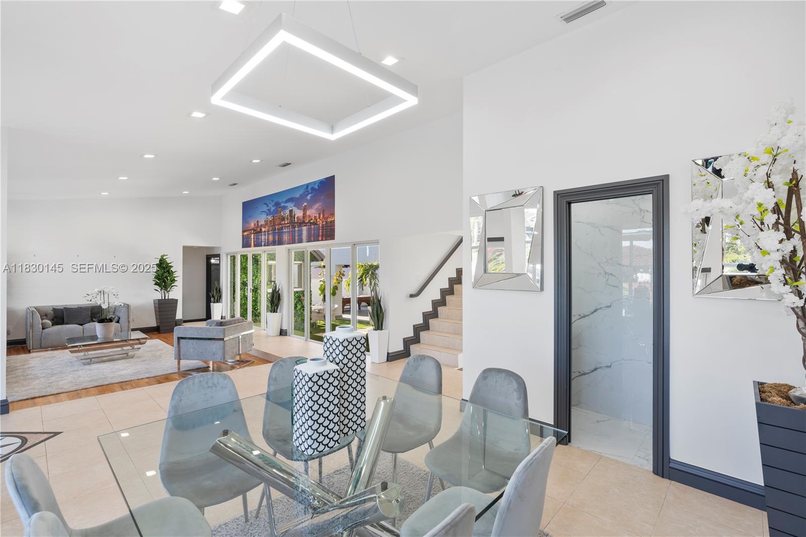 13815 Southwest 38th Street Miami, FL 33175 - Photo 10 of 75 a living room with furniture and wooden floor
