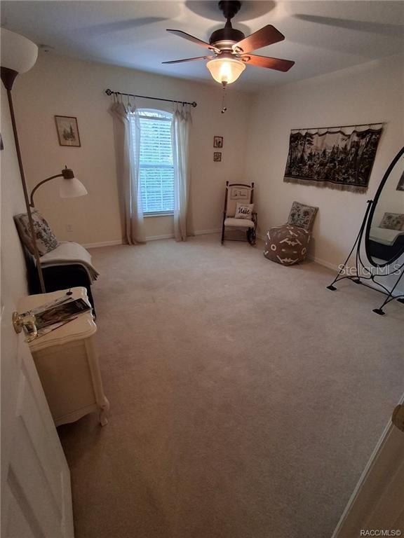 4295 North Bridge Road Beverly Hills, FL 34465 - Photo 26 of 79 a room with gym equipment and a window