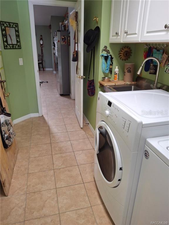 4295 North Bridge Road Beverly Hills, FL 34465 - Photo 32 of 79 a utility room with dryer and washer