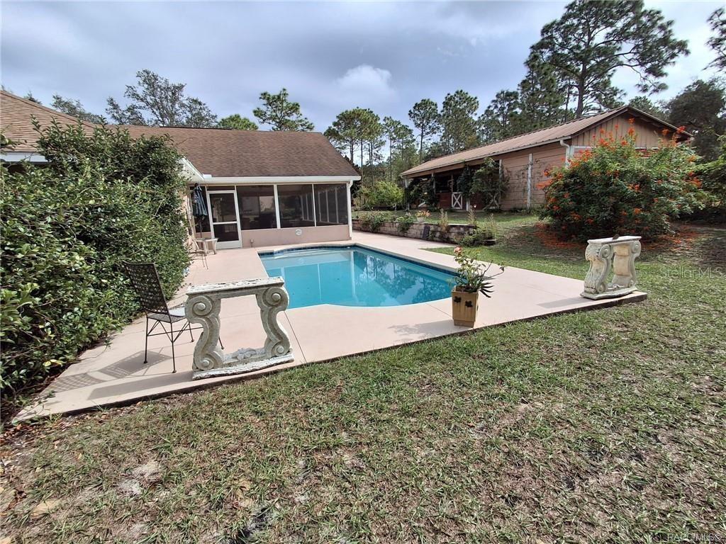 4295 North Bridge Road Beverly Hills, FL 34465 - Photo 43 of 79 an aerial view of house with swimming pool