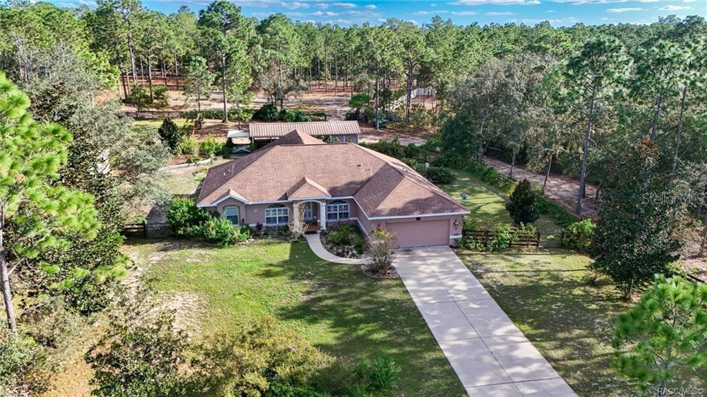 4295 North Bridge Road Beverly Hills, FL 34465 - Photo 48 of 79 an aerial view of a house