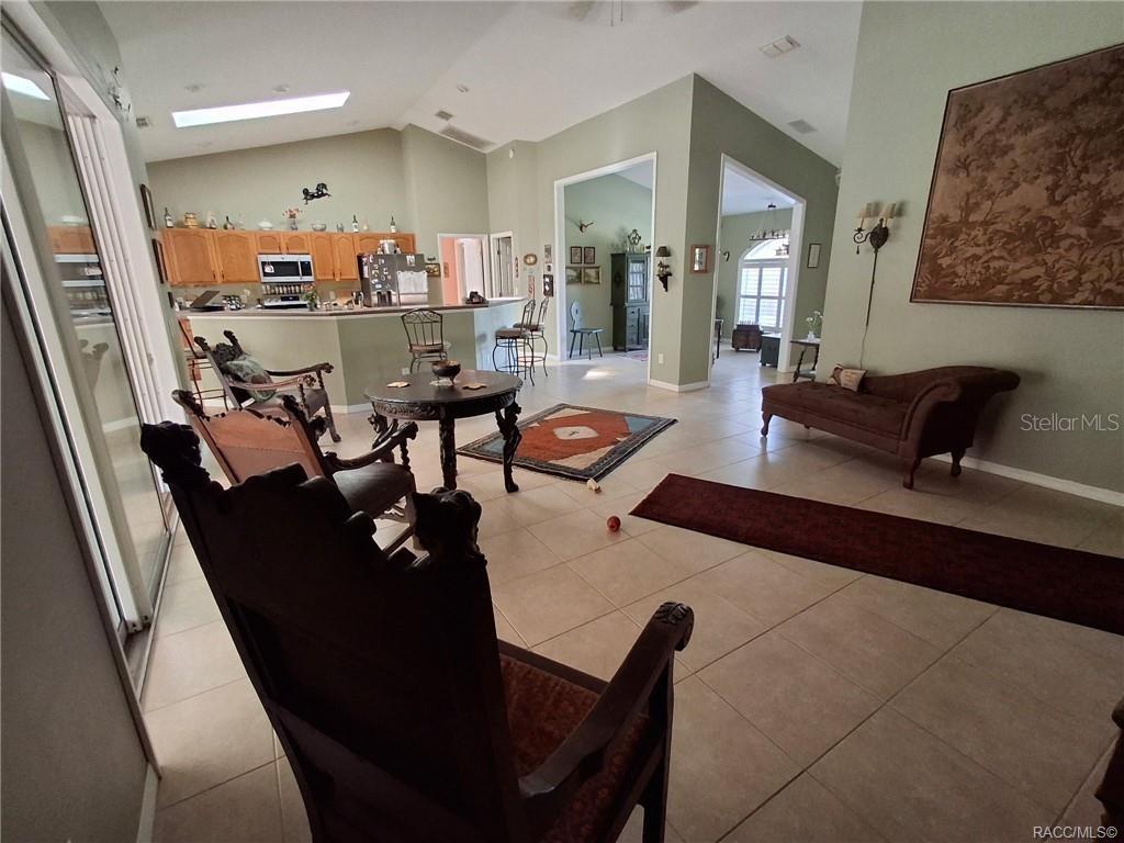 4295 North Bridge Road Beverly Hills, FL 34465 - Photo 5 of 79 a living room with furniture and a couch
